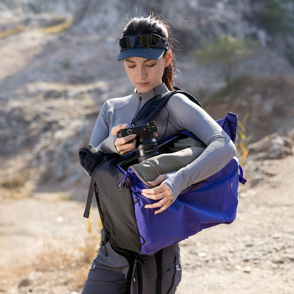 OnePro Ultralight Backpack: Side quick-access for instant capture without removing the pack.