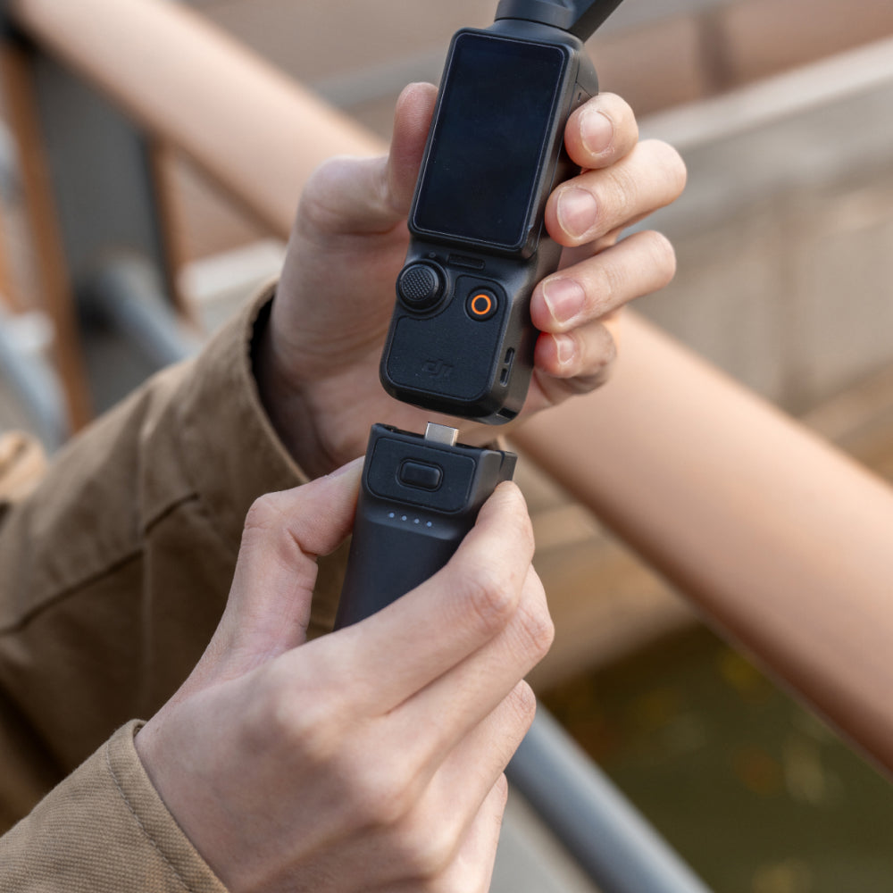The Pocket Battery Handle Offers Versatile Charging with a Rear Type-C Port for Emergency Power.