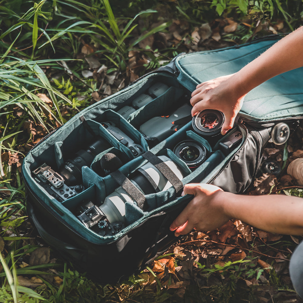 Conveniently storing your gear in the Roller Camera Backpack.